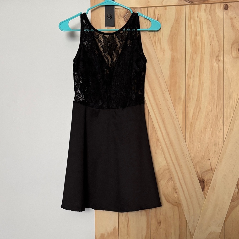New without tags. Elegant Black Lace Mini Dress